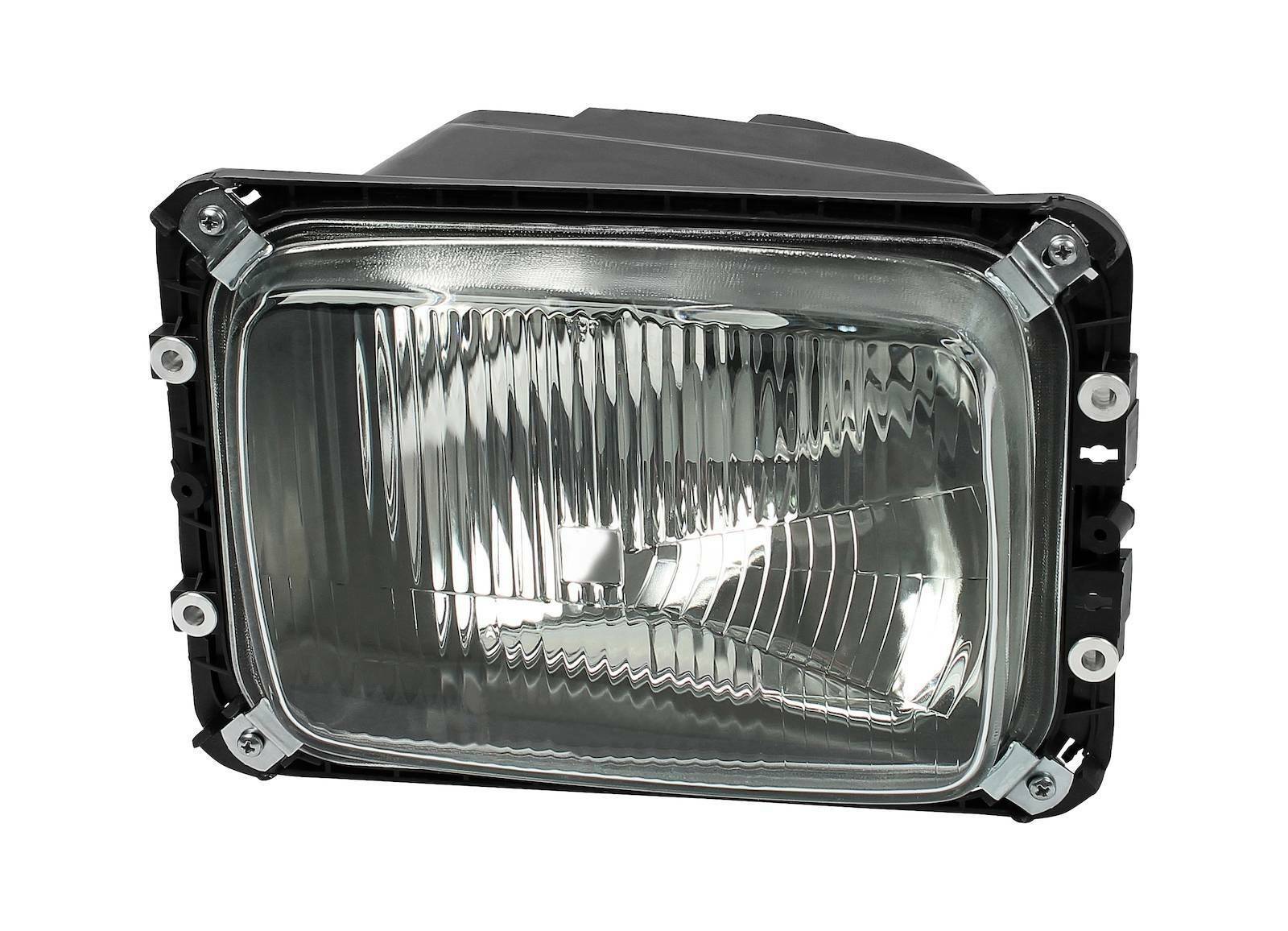 Headlamp DT Spare Parts 4.62355 Headlamp left, without bulbs